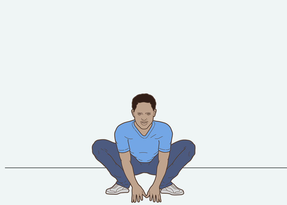 Person squatting down in a 'frog' position.