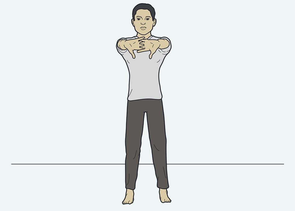 Person in a standing position,with their hands out in front and interlacing their fingers.